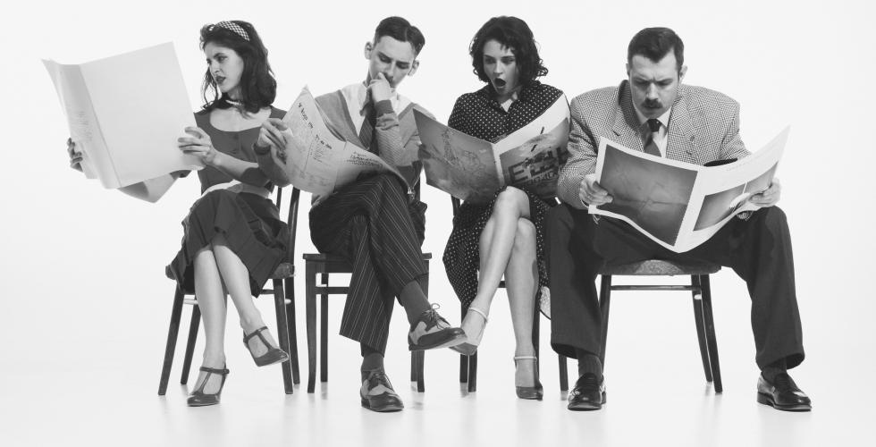 Four people in retro clothing read newspapers, looking shocked.